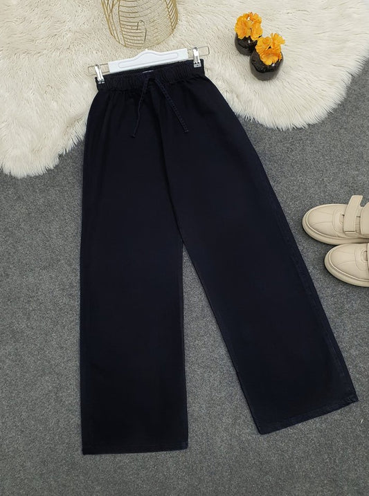 Bol Paça Beli Lastikli Bağcık Detaylı Kot Pantolon -K.Laci