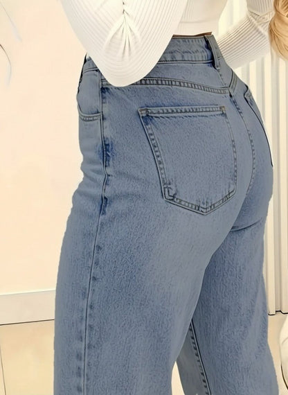 Kadın Yüksek Bel Cepli Paçaya Doğru Geniş Kot Pantolon