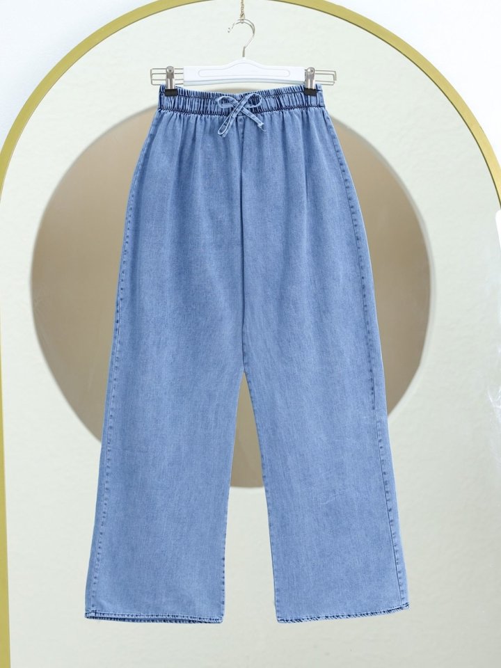Bol Paça Beli Lastikli Bağcık Detaylı Kot Pantolon       -Mavi