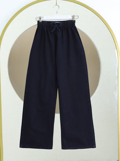 Bol Paça Beli Lastikli Bağcık Detaylı Kot Pantolon     -K.Laci