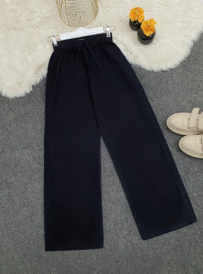 Bol Paça Beli Lastikli Bağcık Detaylı Kot Pantolon     -K.Laci