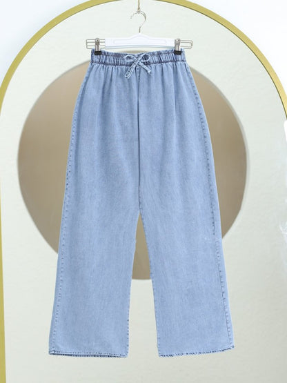 Bol Paça Beli Lastikli Bağcık Detaylı Kot Pantolon      -Buz Mavi