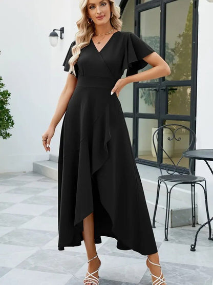 Kadın Kısa Kollu Kruvaze Yakalı önden Volanlı çapraz Kesim Detaylı Maksi Boy Ithal Krep Elbise