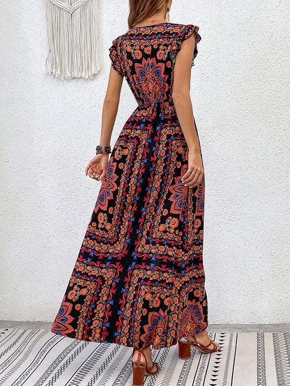 Kadın Kısa Kollu V Yakalı Deseni Yırtmaçlı Süprem Elbise